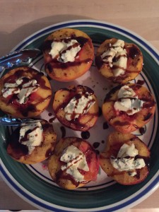 grilled peaches with a dollop of blue cheese