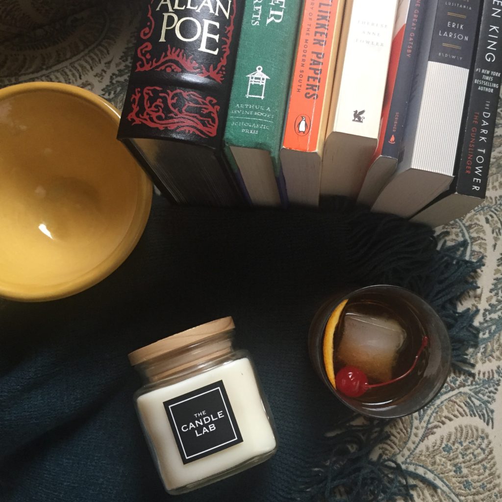 http://columbusculinaryconnection.com/wp-content/uploads/2018/04/Books-bourbon-campfire-candle-1024x1024.jpg